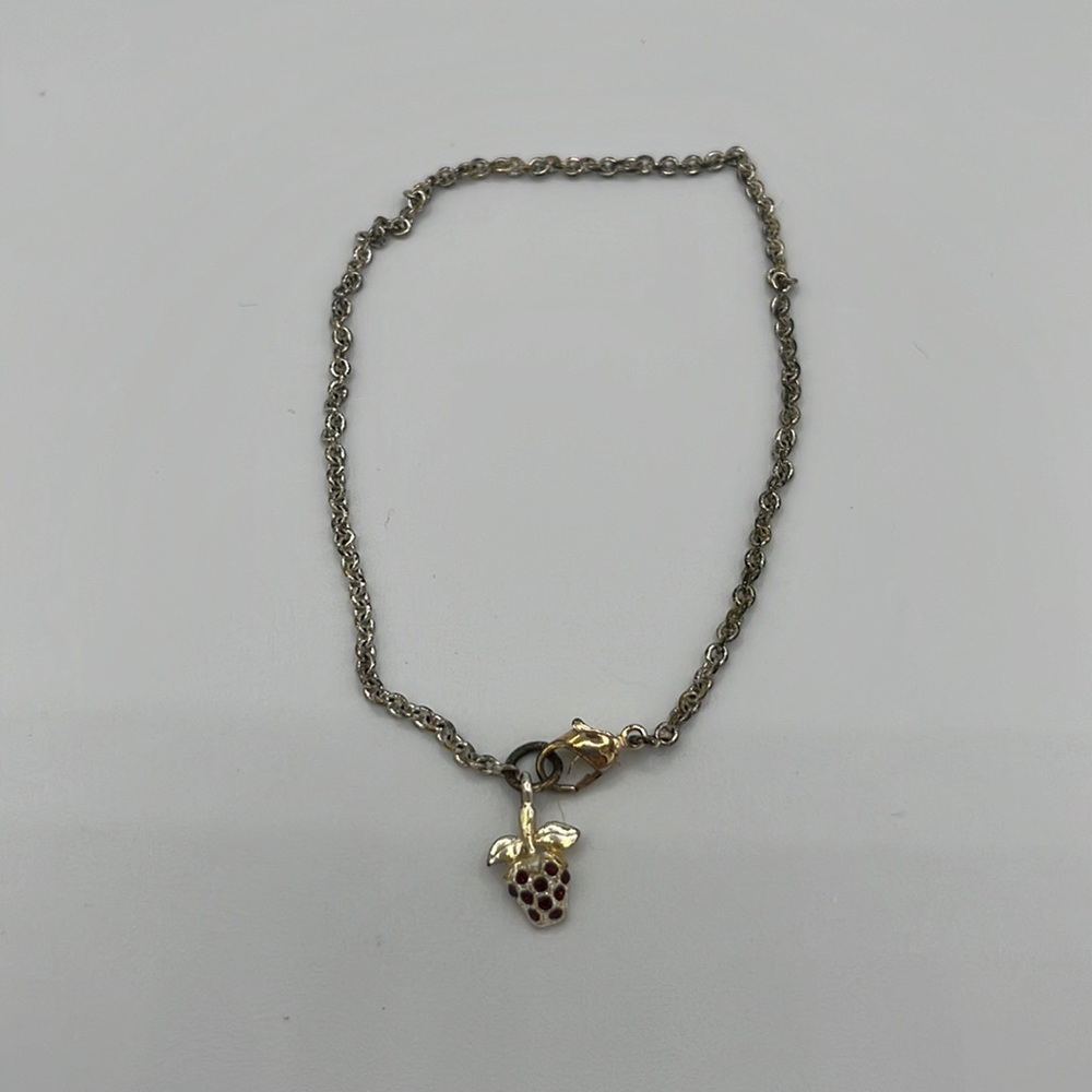 Metal bracelet with strawberry pendant